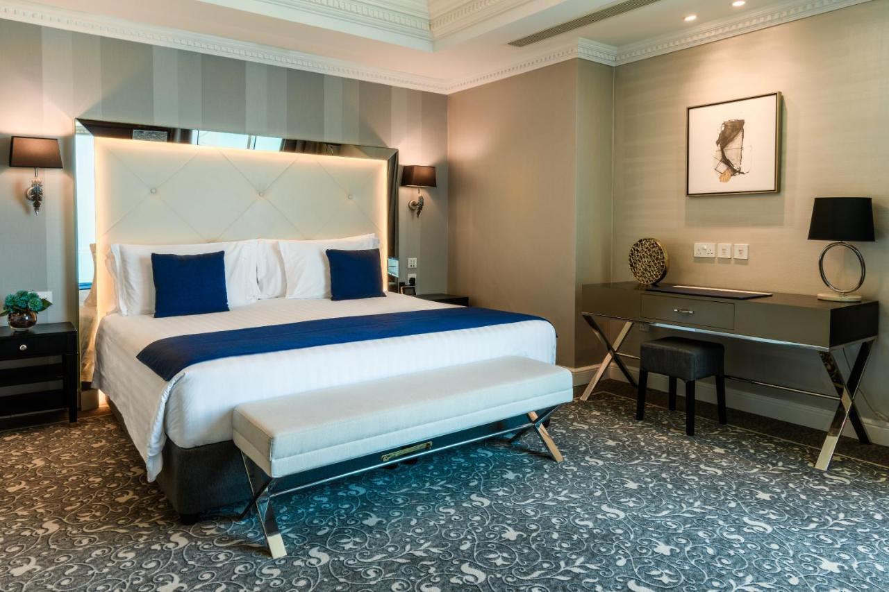 Centara West Bay Hotel & Residences Doha Exterior photo A bedroom at the hotel