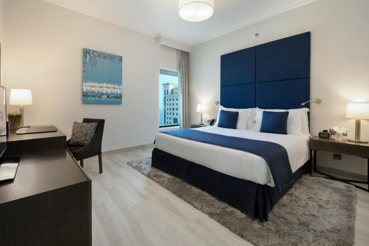Centara West Bay Hotel & Residences Doha Exterior photo A bedroom at the hotel