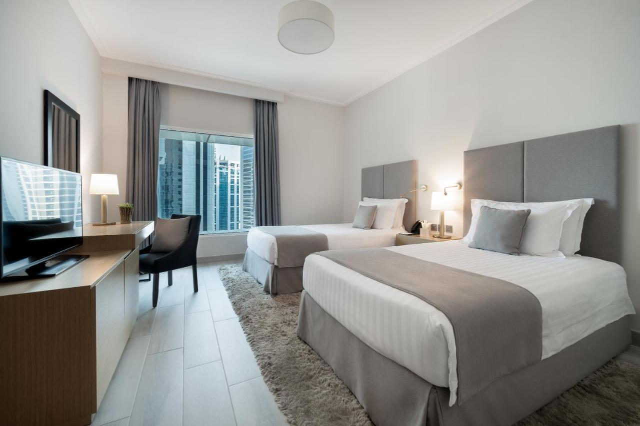 Centara West Bay Hotel & Residences Doha Exterior photo A typical guest room at the hotel