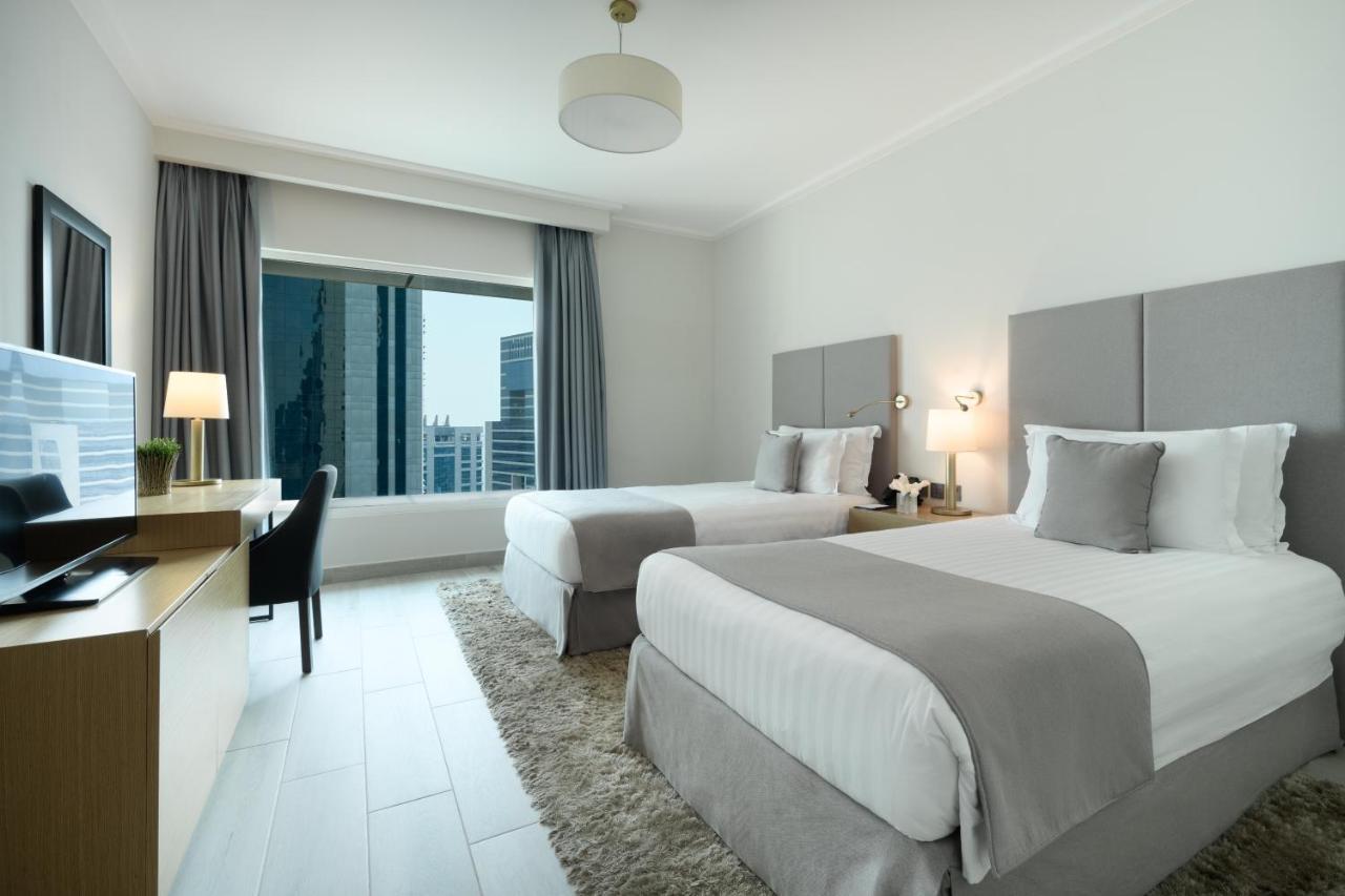 Centara West Bay Hotel & Residences Doha Exterior photo A guest room at the hotel