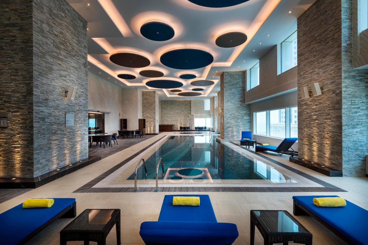 Centara West Bay Hotel & Residences Doha Exterior photo The swimming pool at the hotel